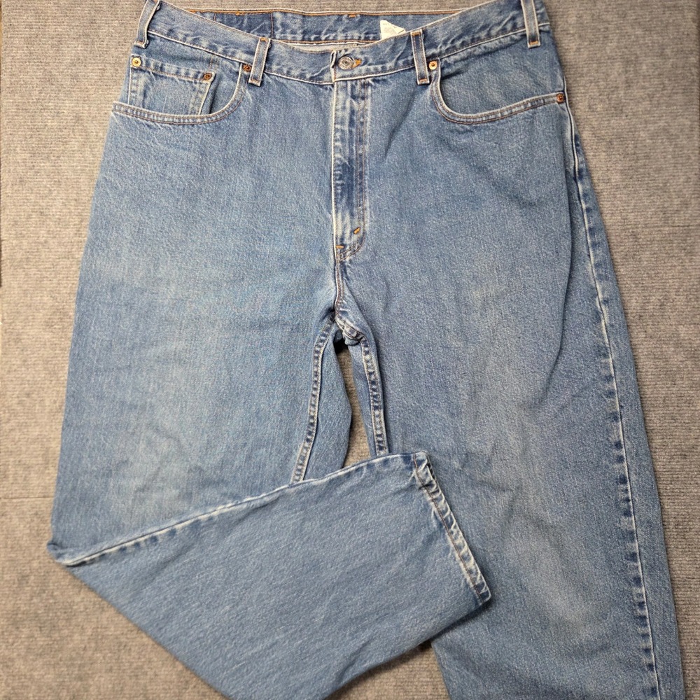 Vintage Levis 560 Jeans Mens 38x31 Made USA Loose Fit Tapered Leg Light Wash